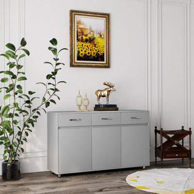 Table d'appoint polyvalente à trois portes pour plusieurs pièces, offrant beaucoup de rangement et un design élégant pour une maison sophistiquée.