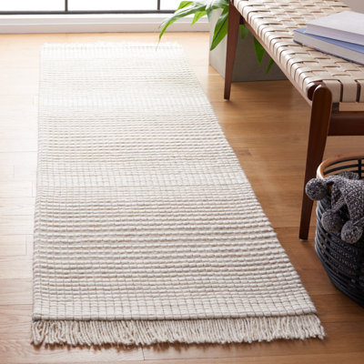 Tapis beige noué à la main