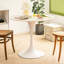 Table de salle à manger blanche élégante avec plateau et support en acier robuste, structure de table de cuisine