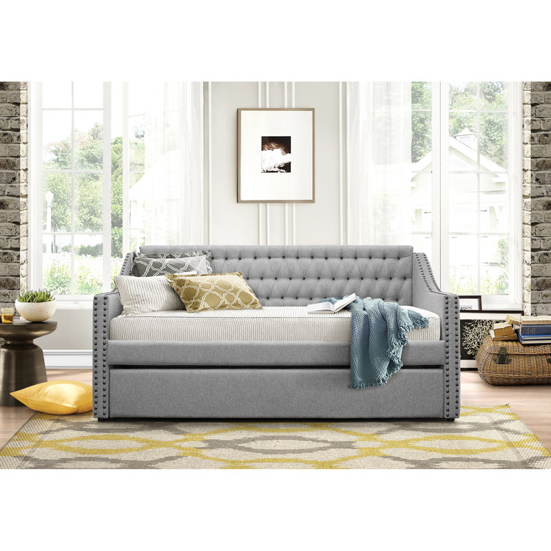 Lit simple avec couchette - Lit de jour rembourré en tissu gris - Ornement moderne avec garniture cloutée, bordure et cadre en bois