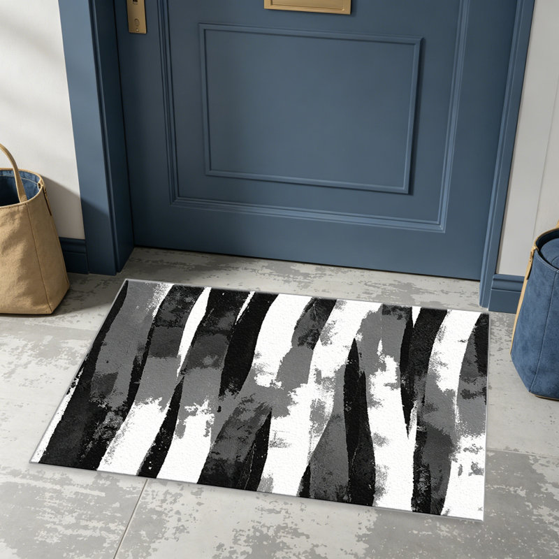 Abstract Black and White carpet-easy to clean, machine-washable, soft and comfortable; suitable for door mats, kitchens, living rooms, bedrooms, corridors, and laundry areas. Easy to clean, durable carpet for home decoration.