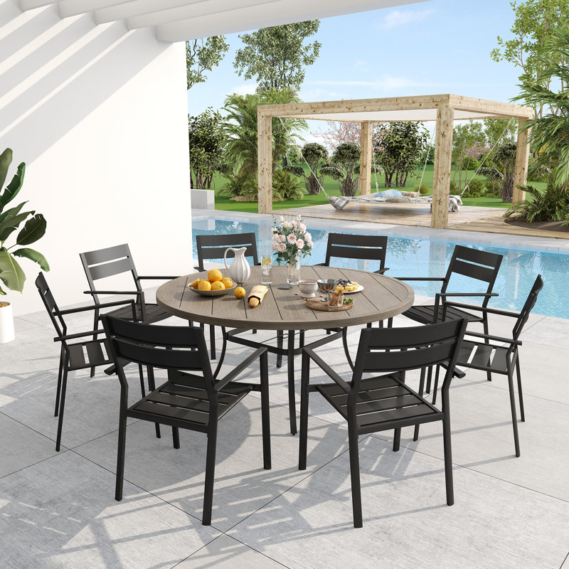 Nazir 8 - Person Metal Patio Dining Set with Round Table, Brush Wood Gray/Gray