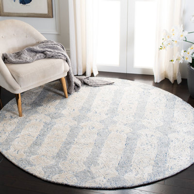 Tapis en viscose / laine touffeté à la main en ivoire / bleu Samaniego