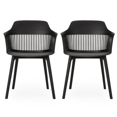 Dahlia Chair - Outdoor. Black Polypropylene, Weather . Elegant Curve. 33''h X 22.5''w 21.5''d. And Stable Frame