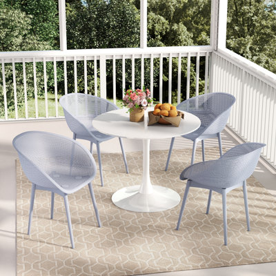 Table de salle à manger en panneau de fibres à densité moyenne avec ensemble de chaises longues résistantes aux intempéries