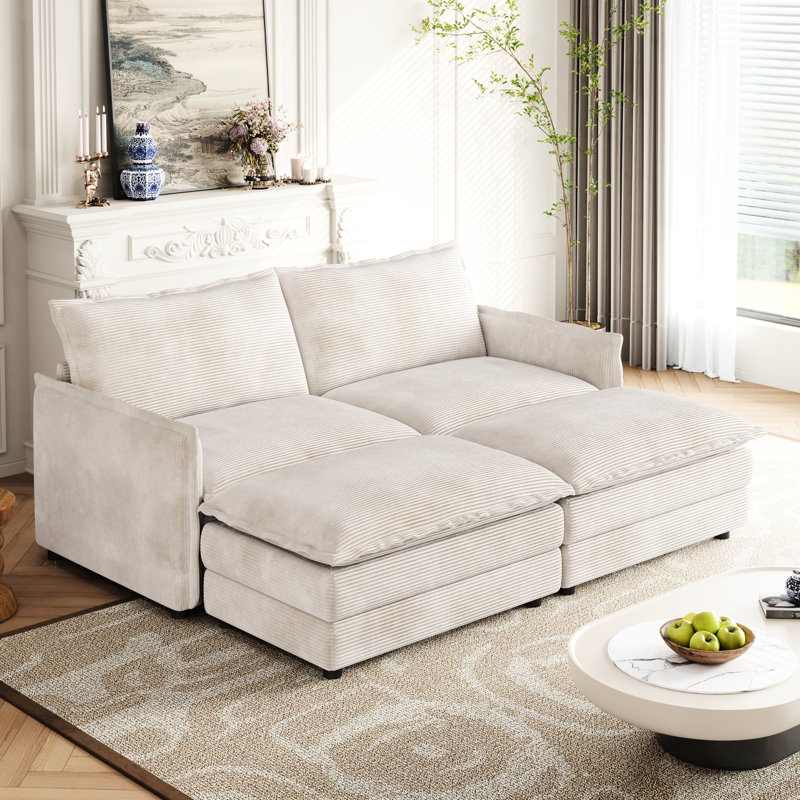 2 fauteuils en velours côtelé pour des moments de détente, repose-pieds amovibles, structure en bois massif, fauteuil inclinable profond, revêtement en tissu, ambiance calme dans le salon, avec 2 poufs, construction, intérieur confortable