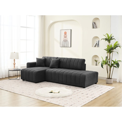 Canapé d'angle en forme de L d'inspiration scandinave, couleur gris foncé, 3 assises garnies de mousse, méridienne réversible idéale pour les petits espaces, revêtement en laine, capitonnage précis et petits modules.