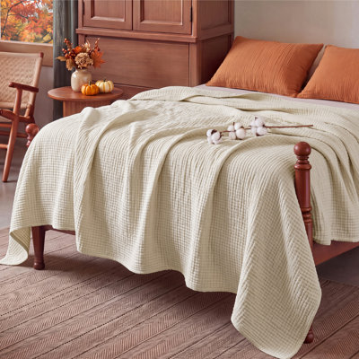 Bedsure 100% Cotton Muslin Blanket, 4-Layer Lightweight Gauze Blanket for Dorm, Couch & All-Season Comfort