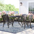 Chachere 4 - Person Patio Dining Set with Round Table