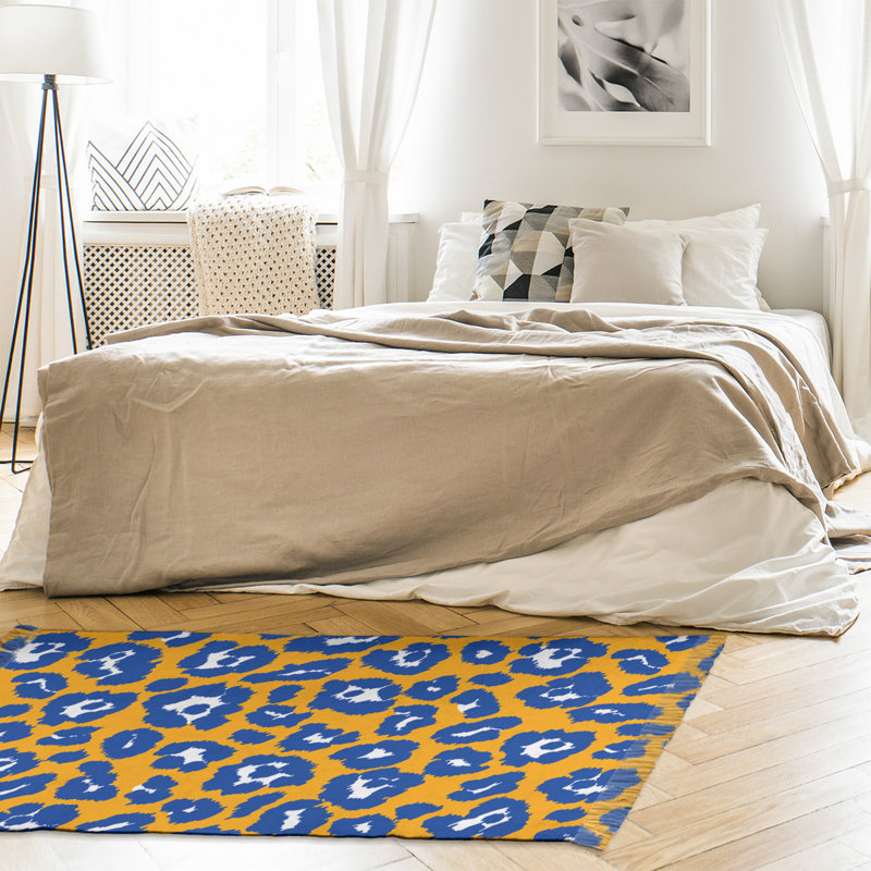 Tapis jaune / bleu à imprimé animal