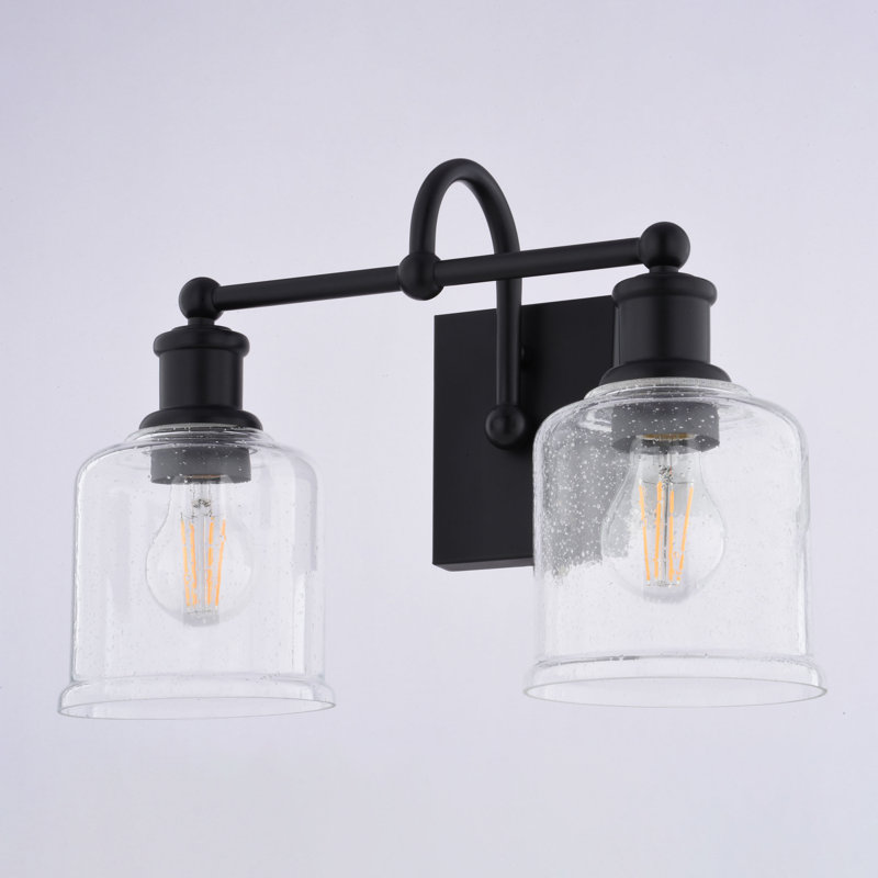 Northbrook Matte Black Traditional Bathroom Vanity Lighting Fixture, Clear Seeded Cylinder Glass Shade, Dimmable, LED Compatible, Reversible Over The Mirror Mounted Steel Wall Sconce