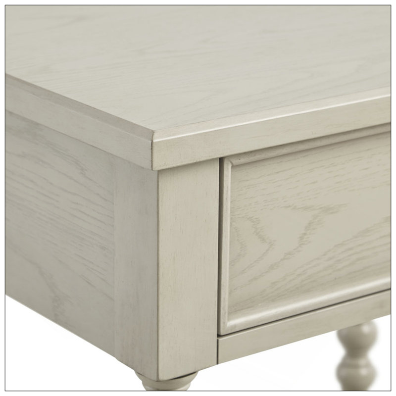 Table de chevet avec glissières en métal durables et finition élégante, parfaite pour les chambres à coucher modernes.