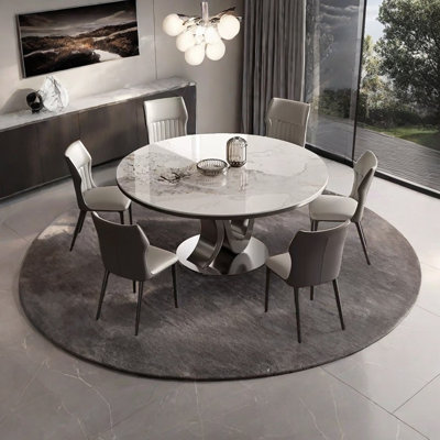Table de salle à manger ronde avec des dalles de roche