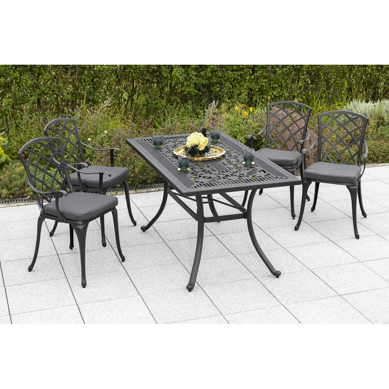 Grasston 4 - Person Patio Dining Set with Rectangular Table , Cushions Included