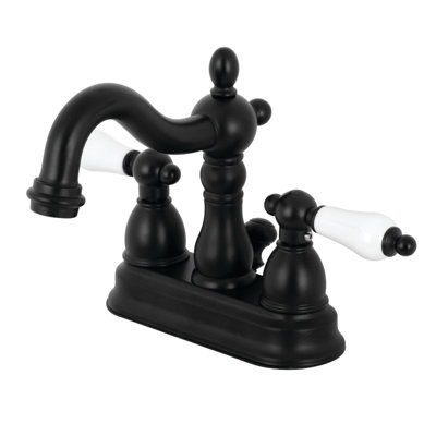 Kingston Brass Heritage Two-Handle 3-Hole Deck Mount 4" Centerset Bathroom Faucet with Plastic Pop-Up