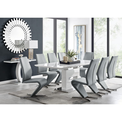 Alezzo Modern High Gloss Extendable Dining Table Set with 8 Modern Design Faux Leather Dining Chairs