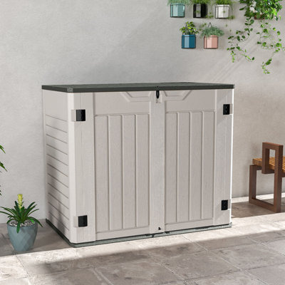 4 pi L 2 pi. D Abri de rangement extérieur en résine