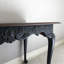 Console de style français en bois sculpté
