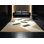 Tapis géométrique beige d'inspiration mondiale Aedan Satay