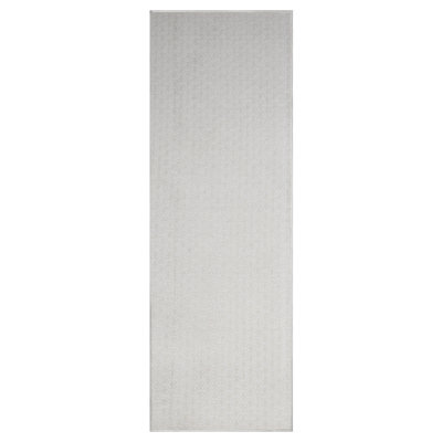 Tapis ivoire à motif géométrique