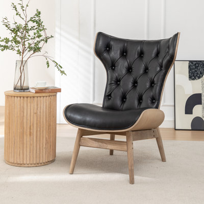 Fauteuil à oreilles en cuir Khamisi