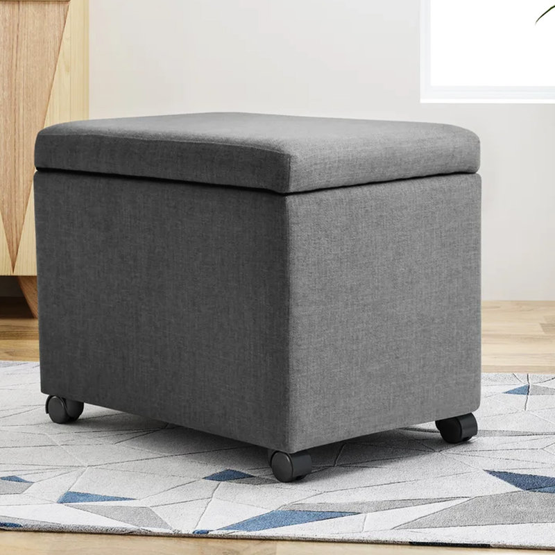 Rangement spacieux en tissu gris avec roulettes pour une organisation efficace à la maison et au bureau