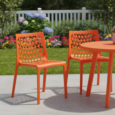 Ensemble de deux chaises de salle à manger d'extérieur empilables en plastique orange