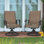 Chaise de patio pivotante pour 2 personnes Sosanna, brun