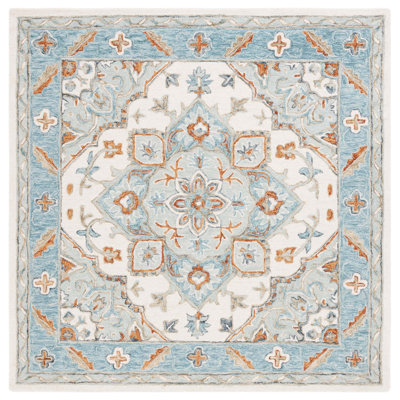 Tapis oriental en laine / coton / latex touffeté à la main Eduvina - orange / gris / bleu