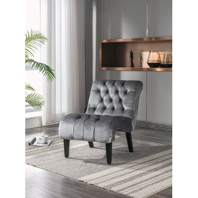 Chaise rembourrée en tissu avec boutons et pieds en bois