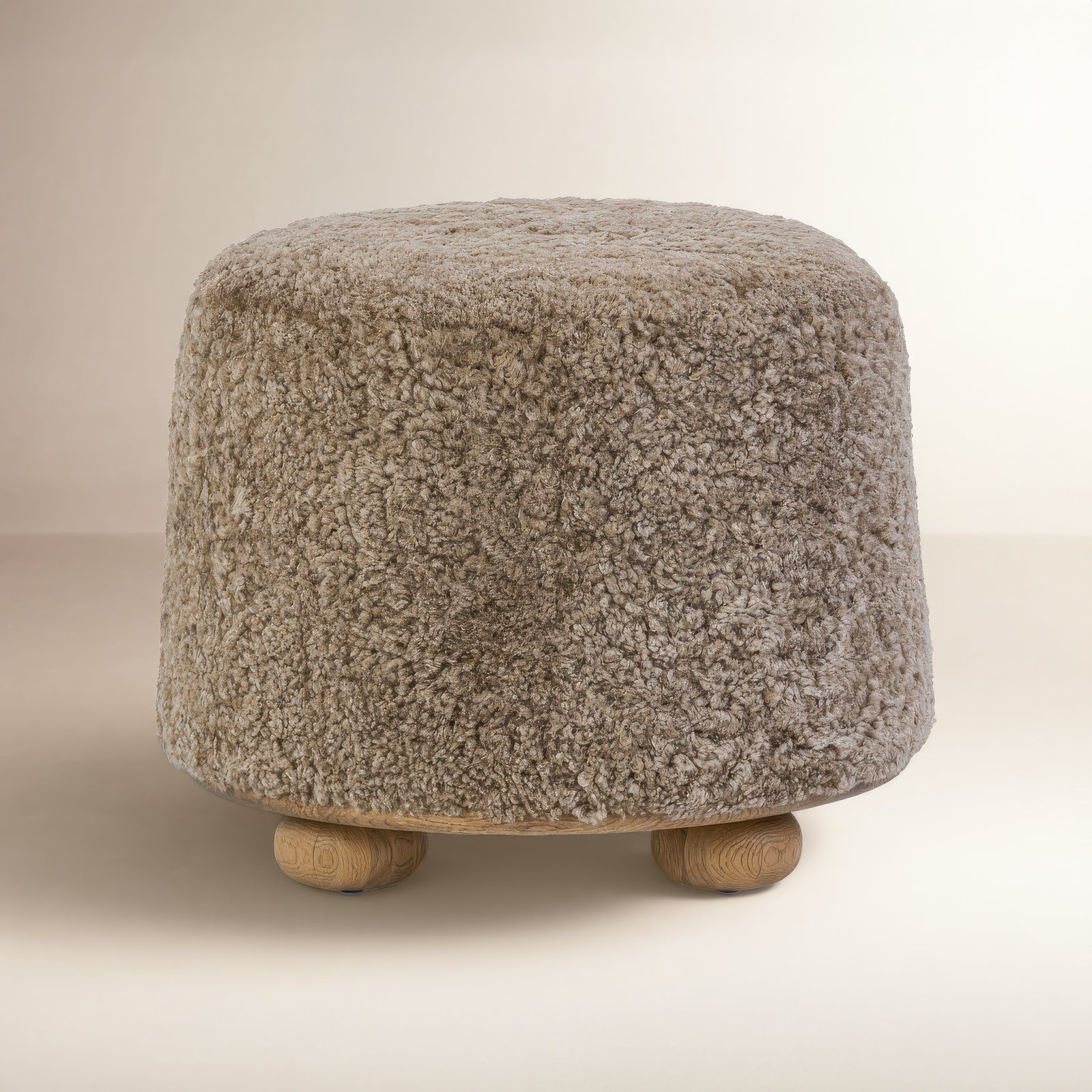 Caraway Upholstered Ottoman, Taupe Shearling