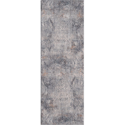 Mariandi Fulton - Tapis à chevrons bleu délavé avec texture moderne