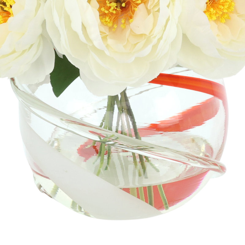 Pivoine disposée dans un vase en verre