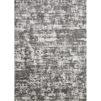 Tapis abstrait en polypropylène tissé à la main Sharitta