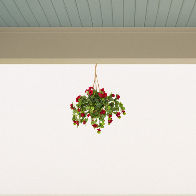Geranium plante artificielle dans un panier suspendu