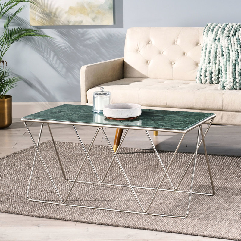 Table basse en marbre avec une belle base faite à la main pour une atmosphère chic
