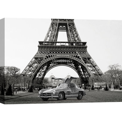 3AP5593 Roadster Under The Eiffel Tower (BW) by Gasoline Images - Wrapped Canvas Art Prints