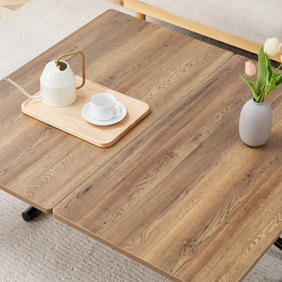 Table élévatrice multifonctionnelle moderne avec plateau en panneau de fibres à densité moyenne de 0,8 po d'épaisseur et pieds en métal noir, pouvant être utilisée comme coiffeuse, table basse, table de salle à manger et table de bureau.