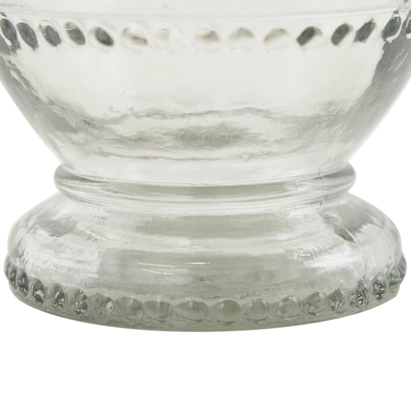 Set of decorative glass jars with glass beads
