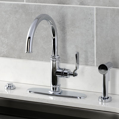 Kingston Brass Whitaker Single-Handle Deck Mount Kitchen Faucet with Brass Sprayer
