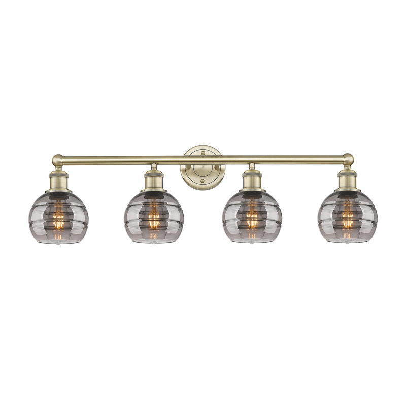 Éclairage pour meuble-lavabo à 4 lumières Chartoff, Gris fumée clair, Laiton antique