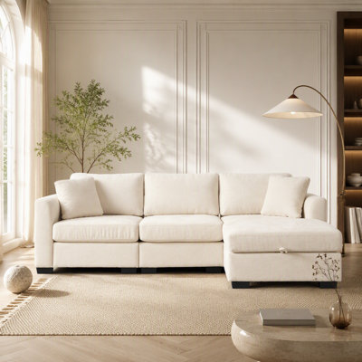 Canapé d'angle moderne en forme de L avec rangement, ports USB, poches latérales et pouf pour un confort spacieux et une organisation intelligente.