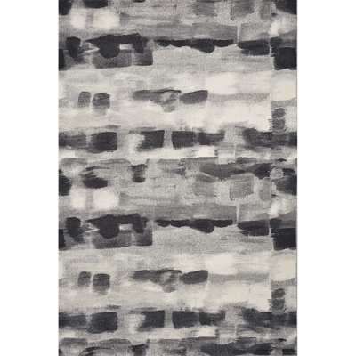 Tapis gris à motif abstrait