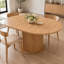 Table de salle à manger ronde extensible avec piédestal cannelé