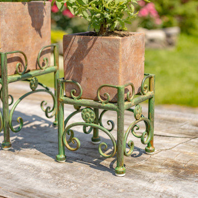Assortiment de pots à fleurs en céramique avec supports en métal (ensemble de 2)