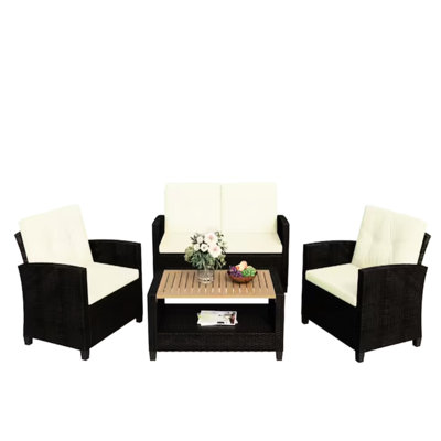 4 - Piece Outdoor Conversation With Beige Cushions And Wood Table For Singing Large Backyards