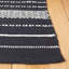 Tapis noir en coton tissé à plat Josie-154332767