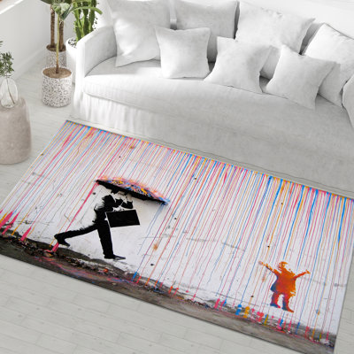 Motif géométrique coloré et vibrant avec un tapis à poils doux, parfait pour n'importe quel décor