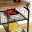 Bureau d'inspiration industrielle avec une construction en métal antique et des roulettes décoratives-1013091859