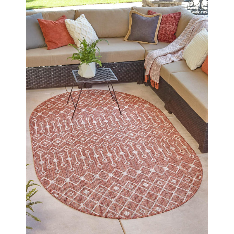 Tapis rouge rouille intérieur / extérieur Julieta, Ovale 7 pi 10 po x 10 pi
